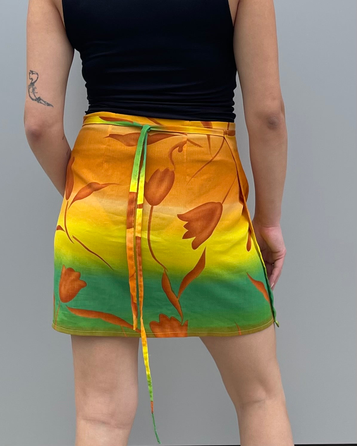 Mini mesh wrap skirt